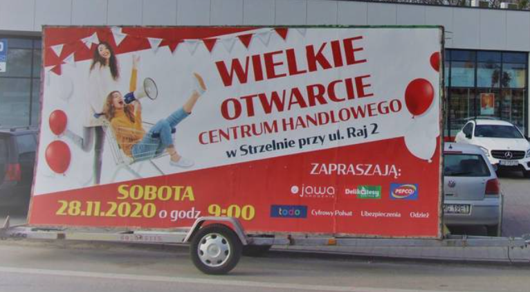 Przykład baneru na przyczepce reklamowej